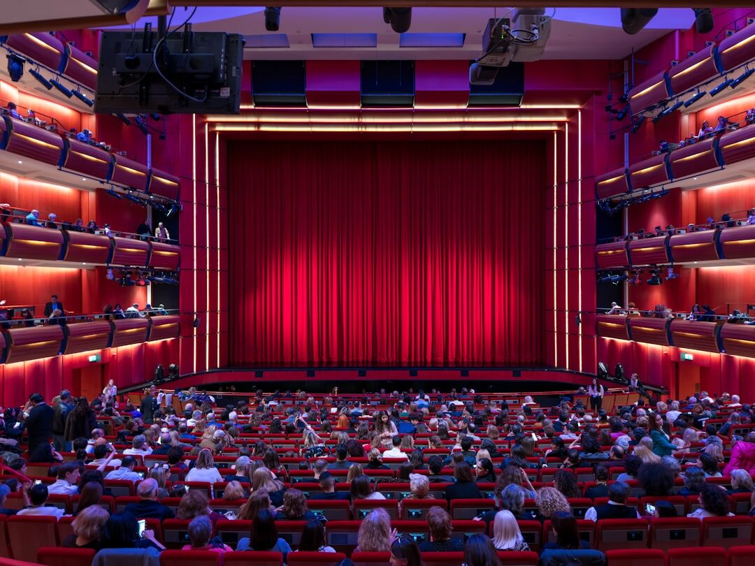 audience clapping in theater